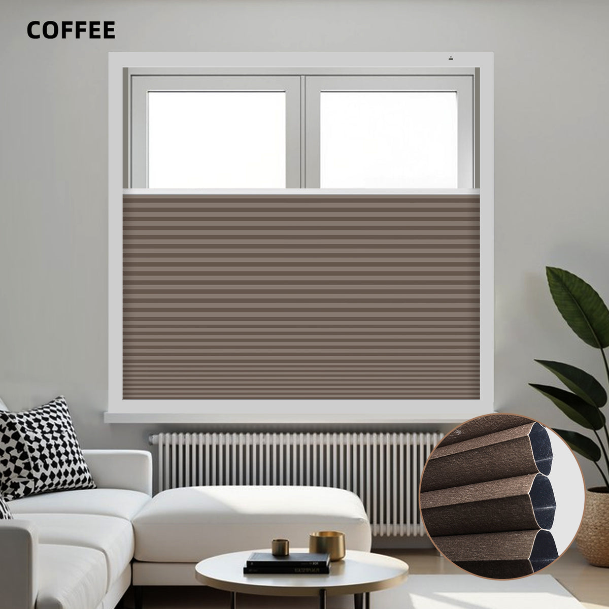 Brown pleated blackout honeycomb shades in a window with a modern living room setting.