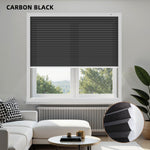 Window with carbon black Cellular blinds in a living room setting