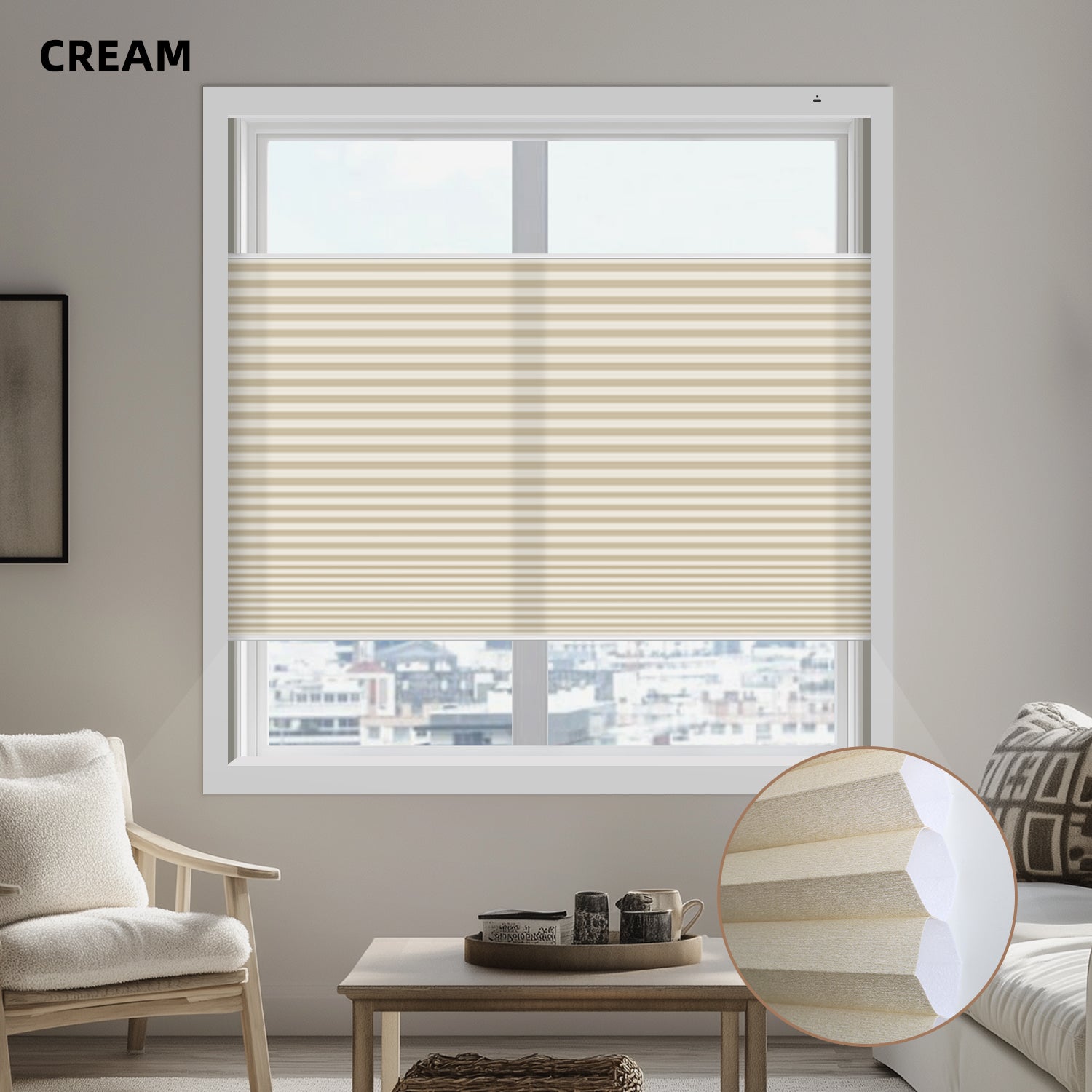 Window with cream light filtering cellular shades in a living room setting