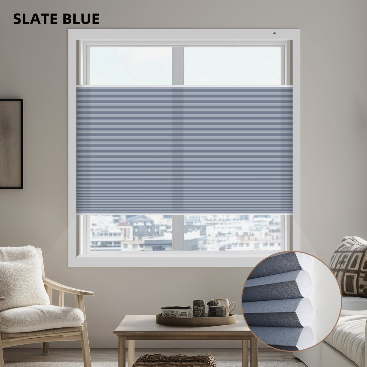 Living room with slate blue window light filtering cellular shades and a cityscape view.